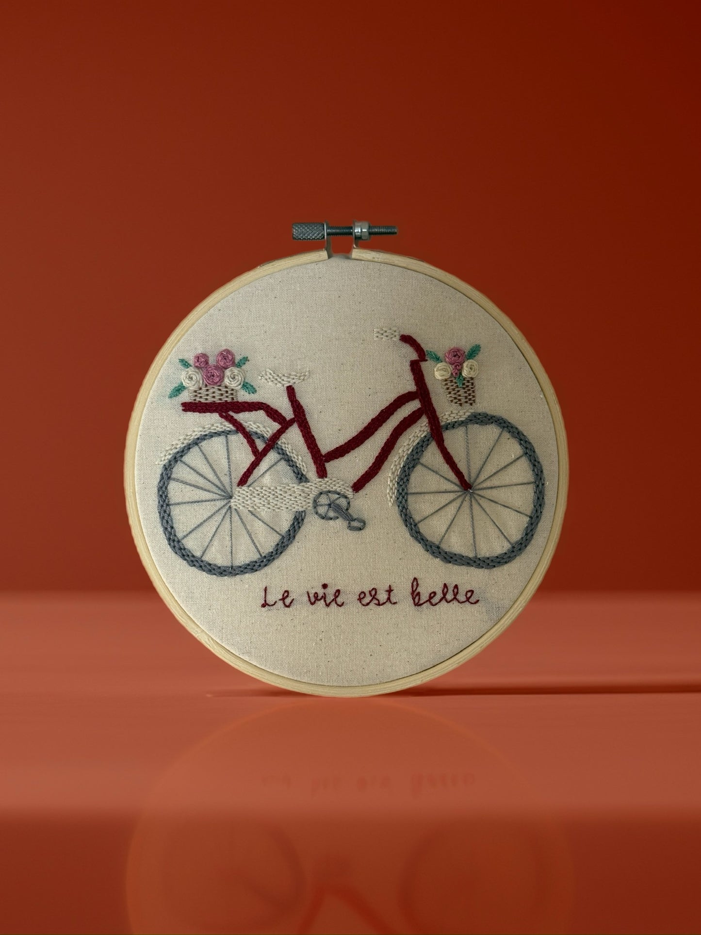 Hand Embroidered Bicycle Hoop – “La vie est belle” Wall Art
